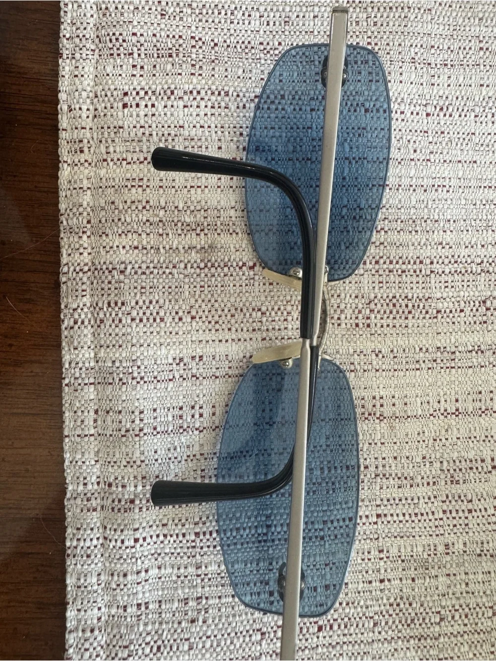 CHANEL Rimless Sunglasses with Blue Lenses and Silver Bridge